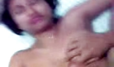 Young porn model walks around the house with bare tits in perverse tights